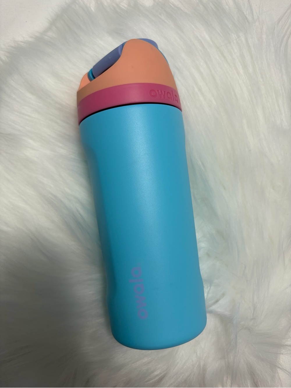 Owala Kids Insulated Bottle in Blue with Pink and Peach Accents